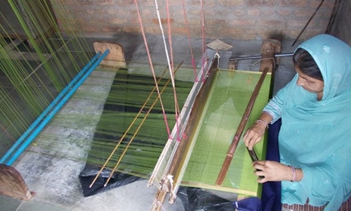 Women in Kaithoon Village engaged in weaving of Kota Doria